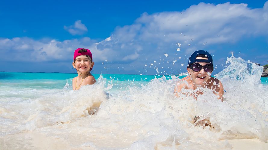 Family, kids in sea, Mauritius